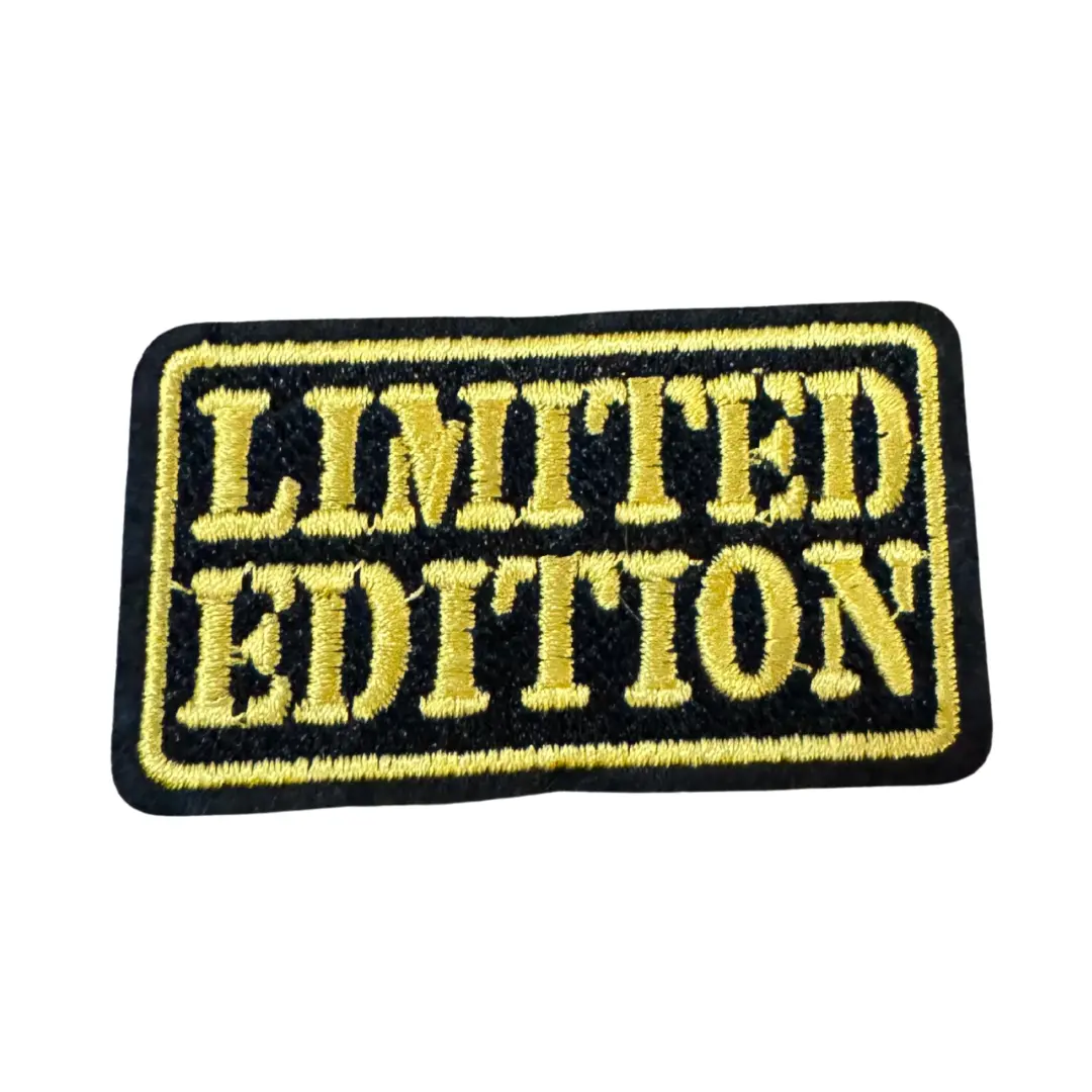 Strijkembleem/applicatie, 'limited edition" zwart/geel 1 Strijkembleem/applicatie, 'limited edition" zwart/geel